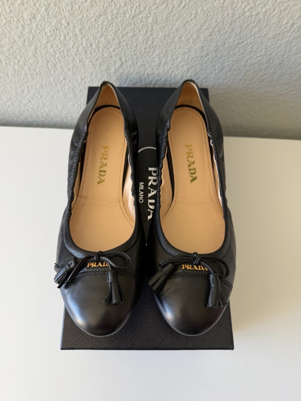 Prada Black Leather Ballet Flats with Tassel Detail